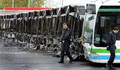 27 сгоревших автобусов в Траппе. Фото АР